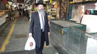 מה עשה המקובל הרב יצחק בצרי בשעה 6:30 בבוקר בשוק מחנה יהודה?