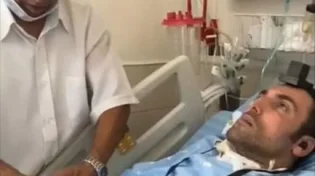 לצד מכונות ההנשמה: אלון פז אשר מוגבל בגופו מניח תפילין