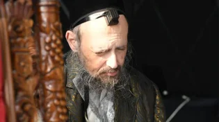 על שם מי נקרא הרב דב קוק שליט"א?
