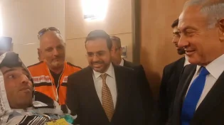 משותק ומונשם עטוף כולו בטלית ותפילין במפגש מרגש עם נתניהו