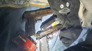 השוטרים נדהמו לגלות נשק מוסלק בקיר המפעל