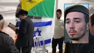 המתנדבים החרדים בהדלקת נר חנוכה בבית החייל שנפל