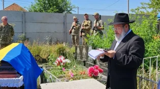 בלוויה מצומצת: גפיו של הלוחם היהודי הובאו לקבורה