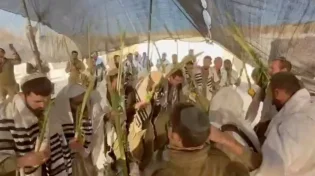 טלית, לולב ונשק: הבוקר של הלוחמים בעזה נראה אחרת לגמרי