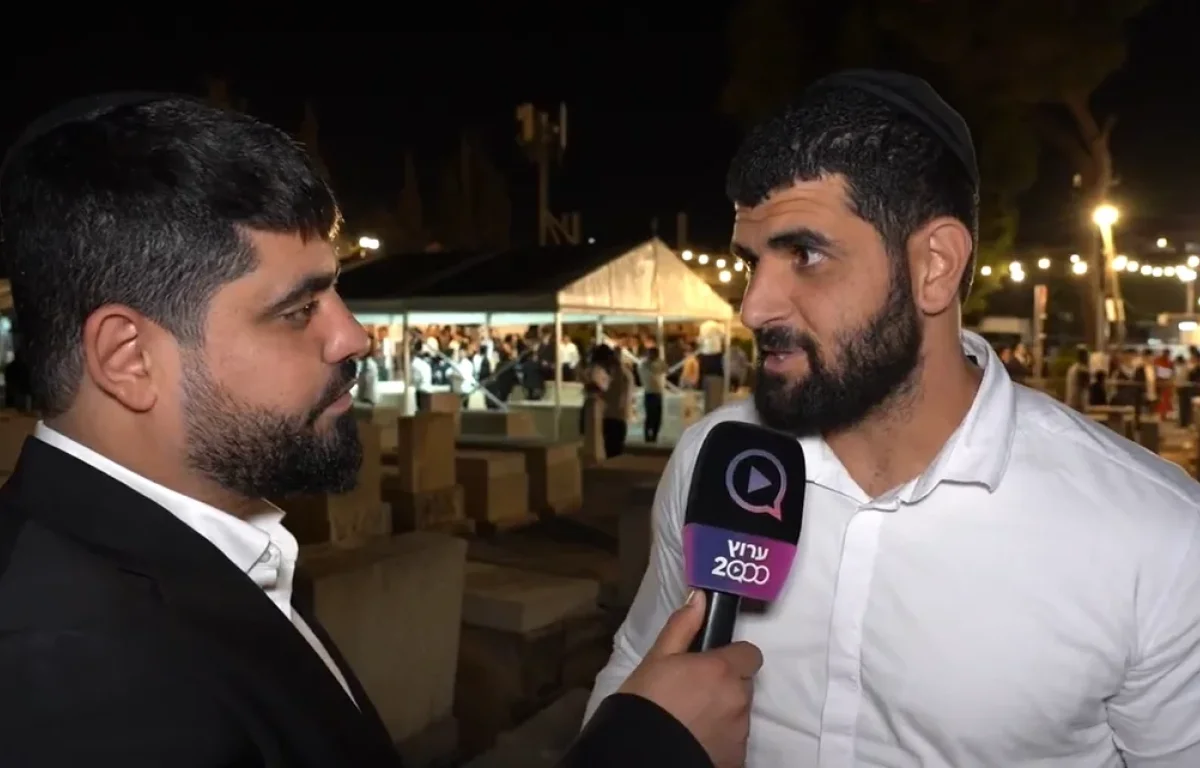 מנחם, אלוף הארץ בהרמת משקולות בראיון ל'ערוץ 2000'&nbsp;